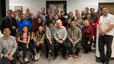 Group photo of library staff, faculty, and administrators