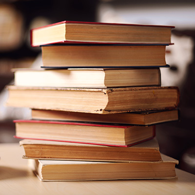 A stack of hardbound books