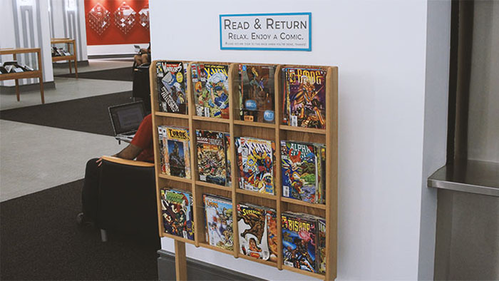 A display rack of comics featured in DemoGRAPHICS.