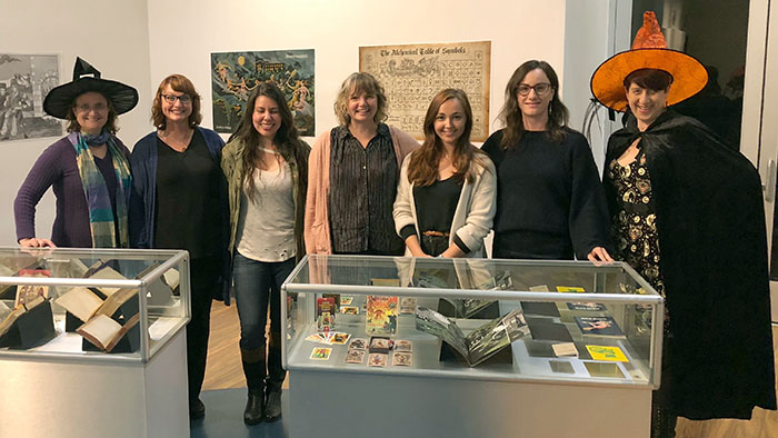 SCUA faculty and staff at Witches in Popular Culture exhibition